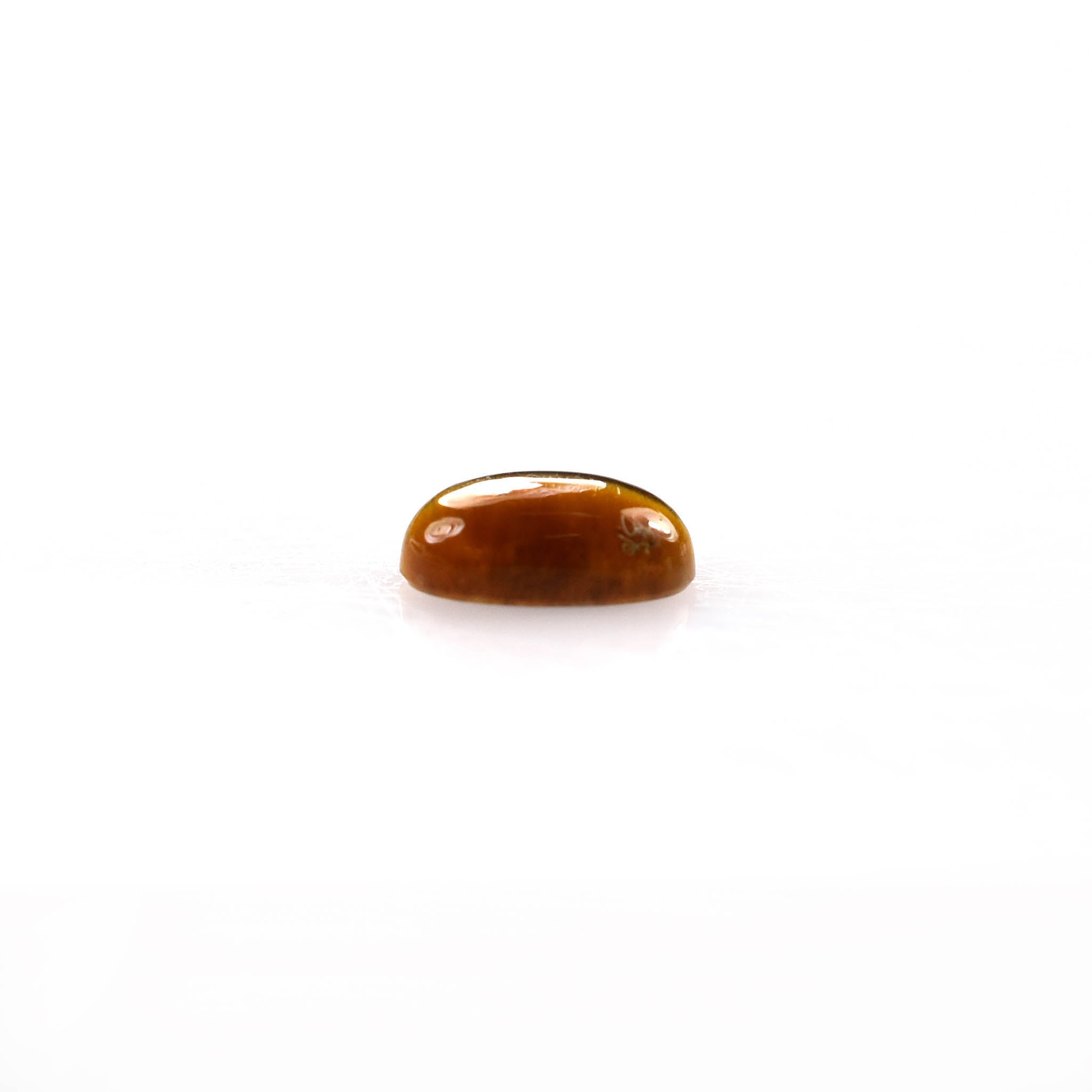 YELLOW TIGER EYE PLAIN OVAL CAB (OPAQUE)(CLEAN) 6.00X4.00 MM 0.42 CTS