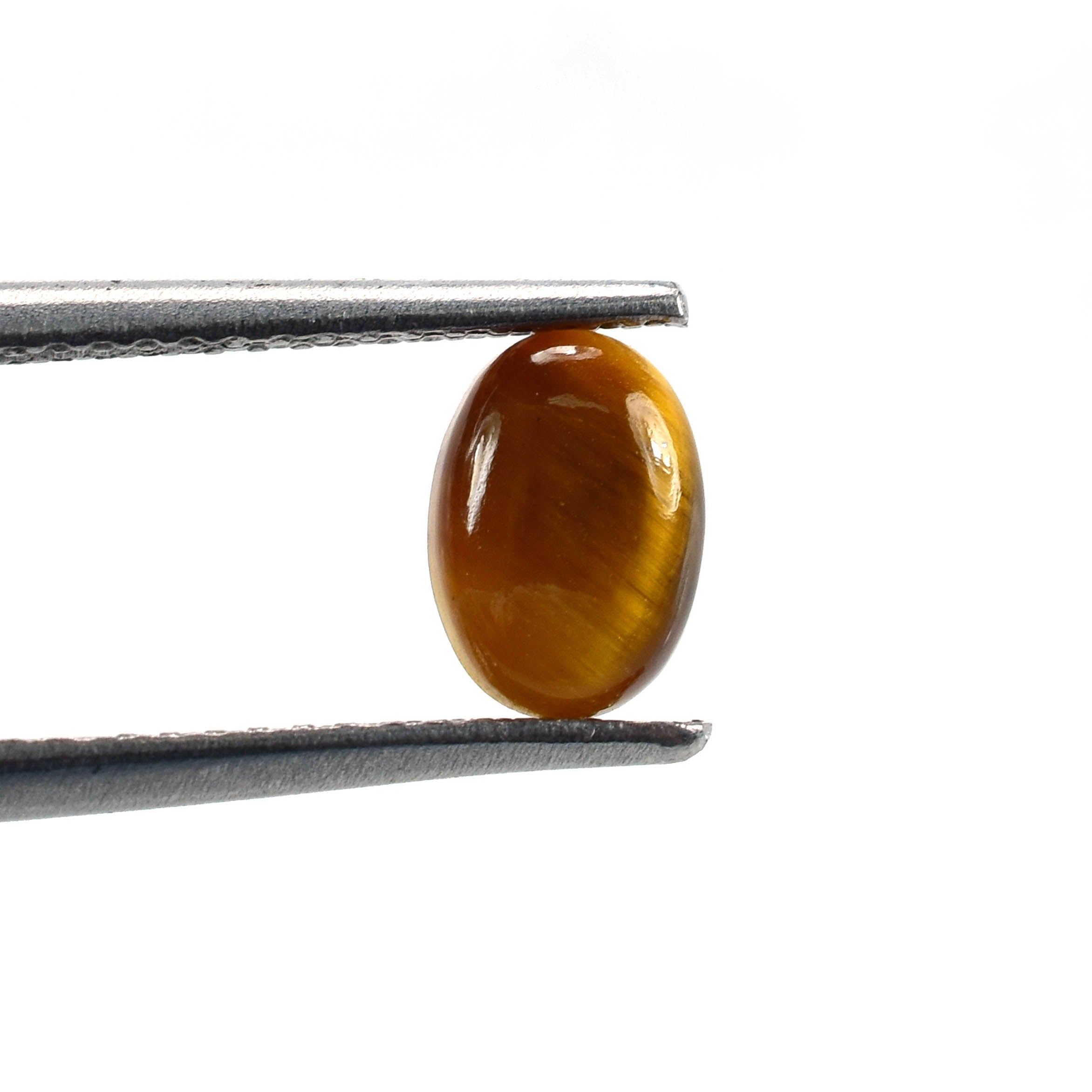 YELLOW TIGER EYE PLAIN OVAL CAB (OPAQUE)(CLEAN) 7.00X5.00 MM 0.66 CTS