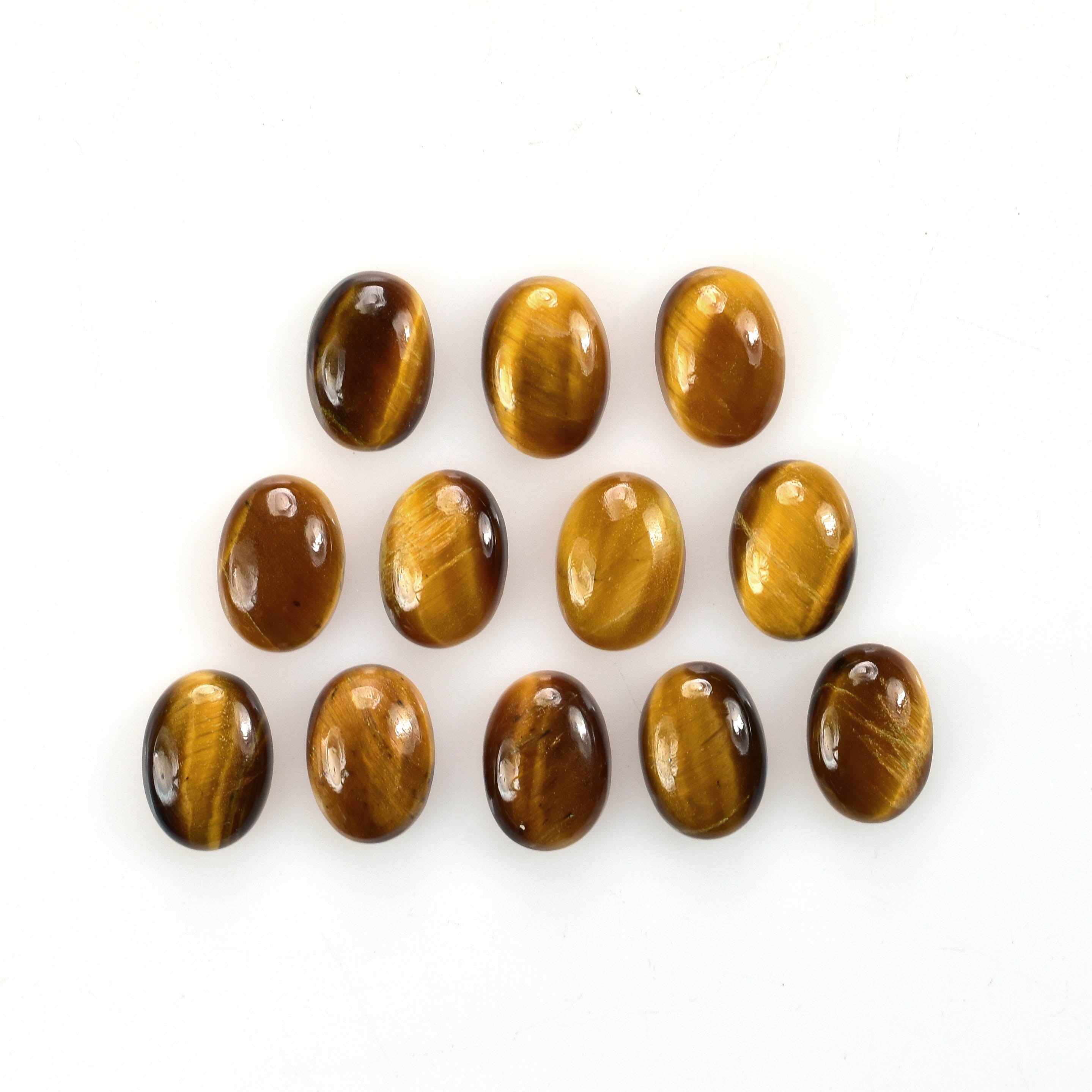 YELLOW TIGER EYE PLAIN OVAL CAB (OPAQUE)(CLEAN) 7.00X5.00 MM 0.66 CTS
