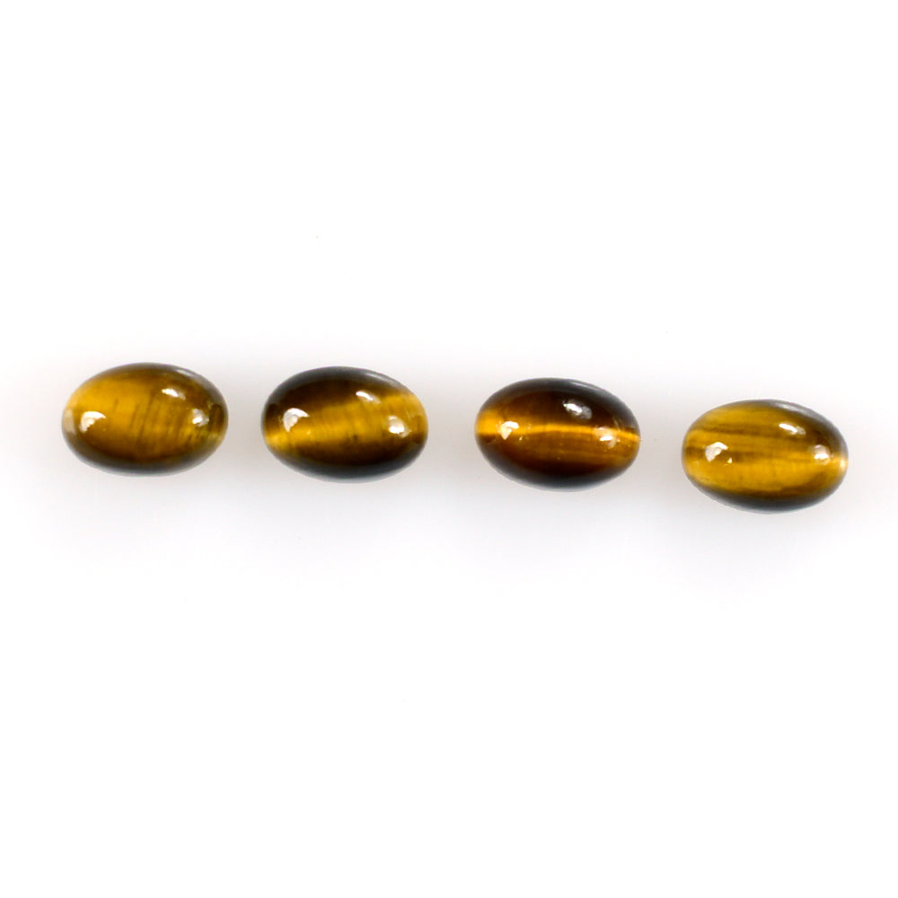 YELLOW TIGER'S EYE QUARTZ OVAL CAB 6X4MM 0.66 Cts.