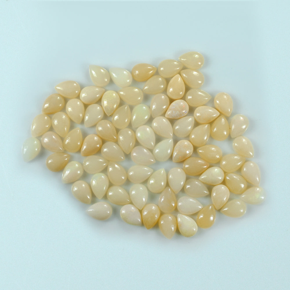 WHITE OPAL (WHITE) ( VERY MILKY) PLAIN PEAR CAB 10.00X7.00 MM 1.04 Cts.