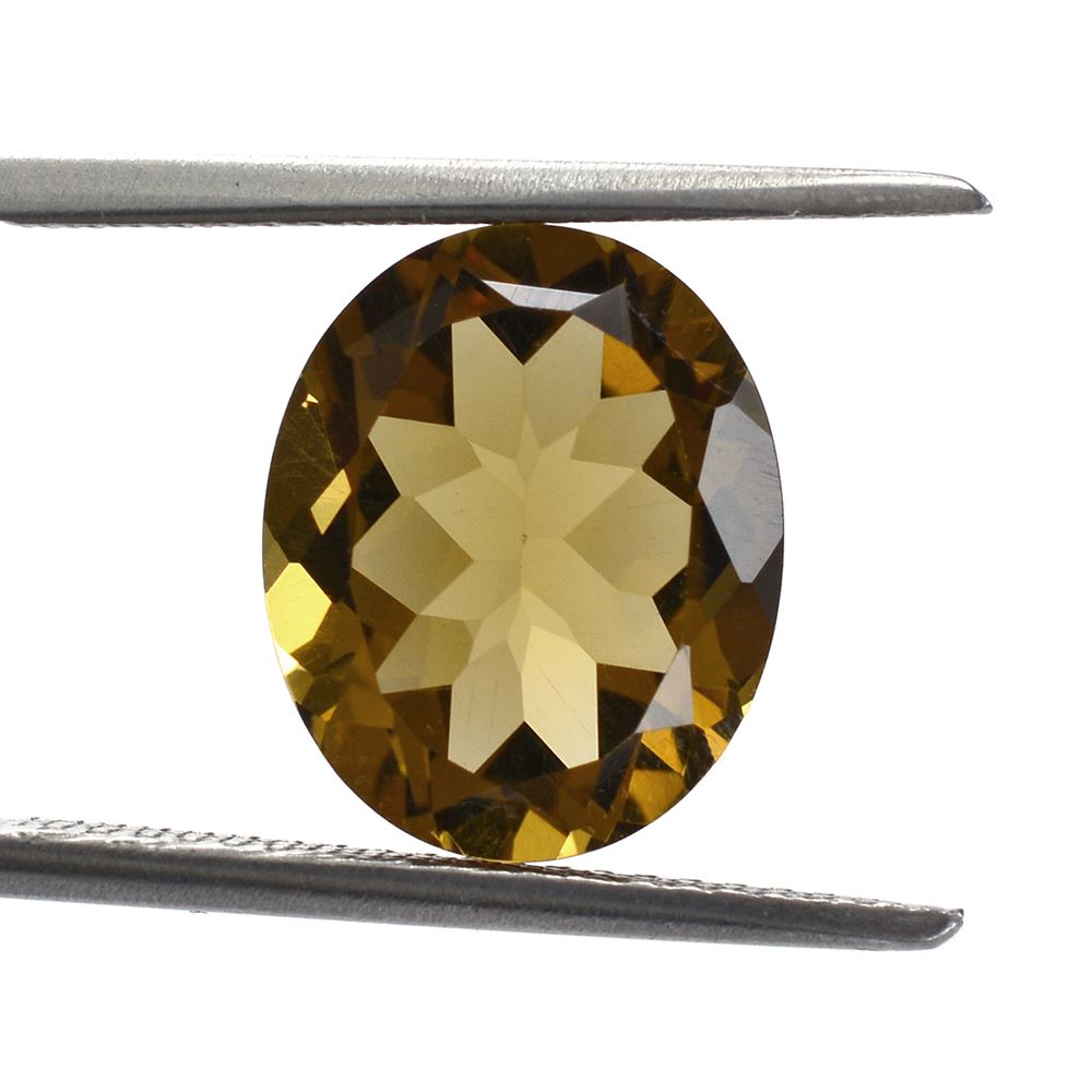 WHISKY QUARTZ CUT OVAL 12X10MM 4.34 Cts.