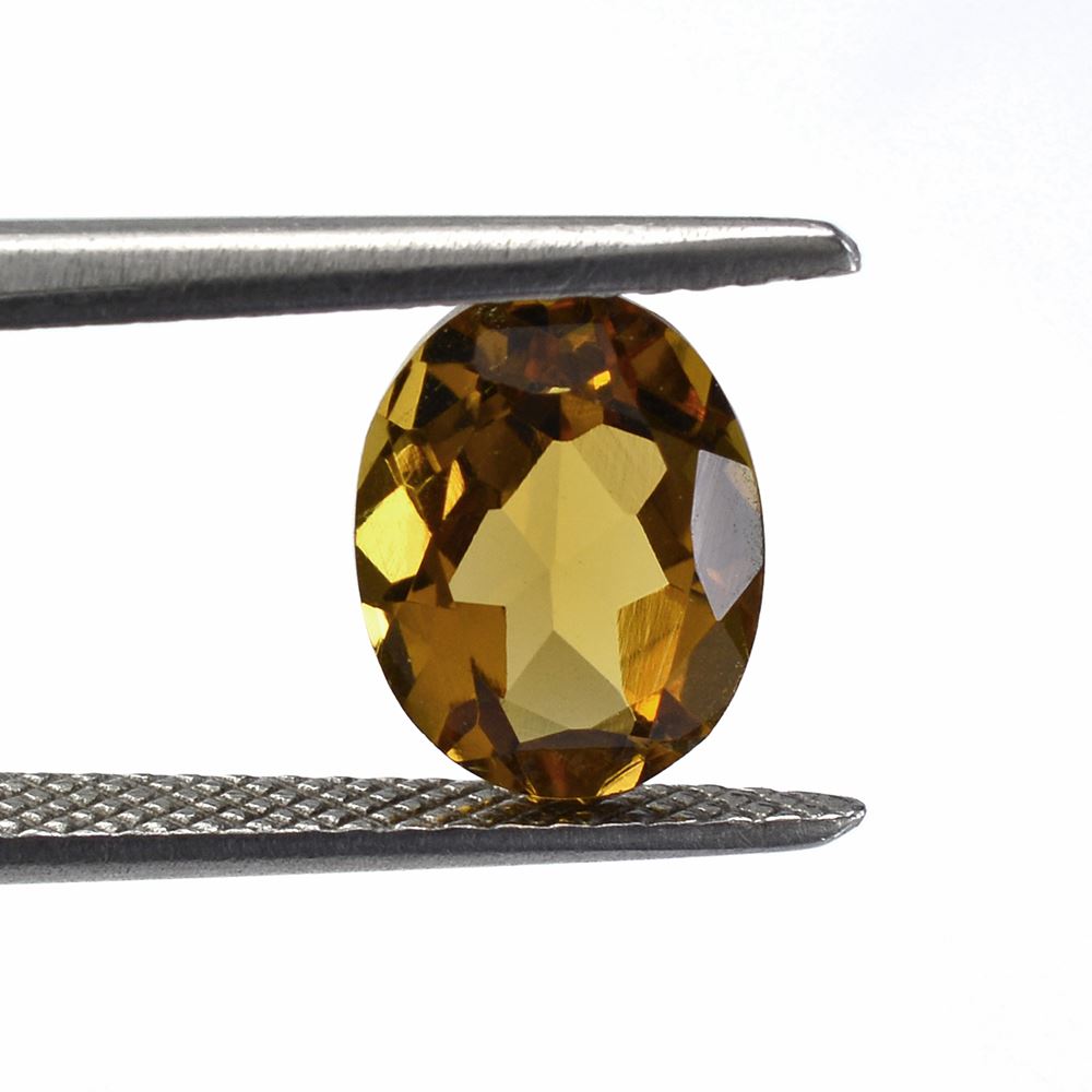 WHISKY QUARTZ CUT OVAL 9X7MM 1.67 Cts.