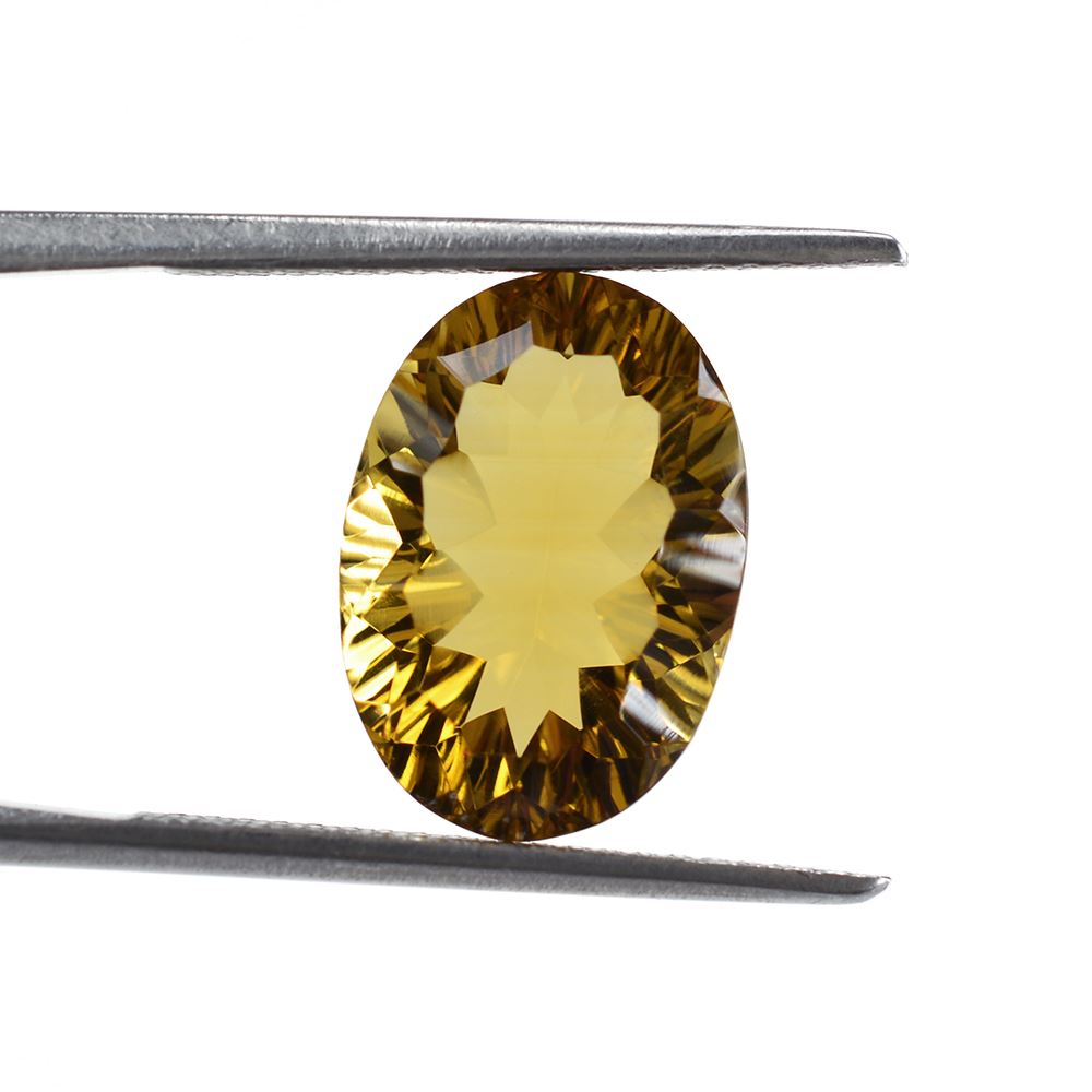 WHISKY QUARTZ CONCAVE CUT OVAL 14X10MM 5.26Cts.