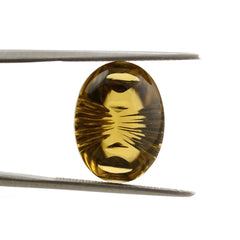 WHISKY QUARTZ BUFFTOP LAZER CONCAVE BACK OVAL 16X12MM 8.85Cts.