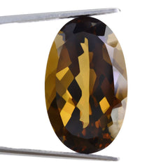 WHISKY QUARTZ CUT OVAL 24X15MM 23.70 Cts.