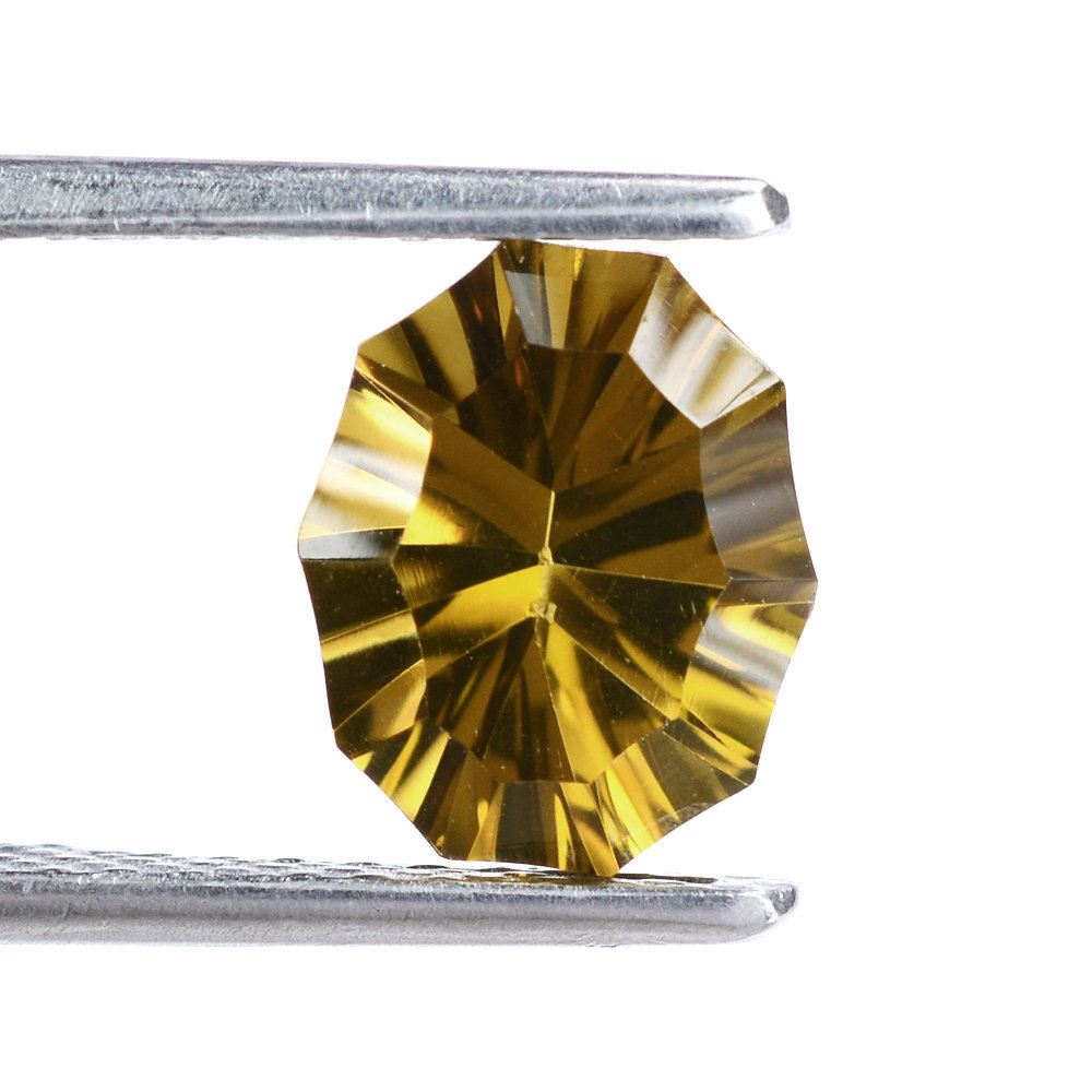 WHISKY QUARTZ CONCAVE NINETY CUT OVAL (DES#51) 10X8MM 2.23 Cts.