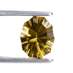 WHISKY QUARTZ CONCAVE NINETY CUT OVAL (DES#51) 10X8MM 2.23 Cts.