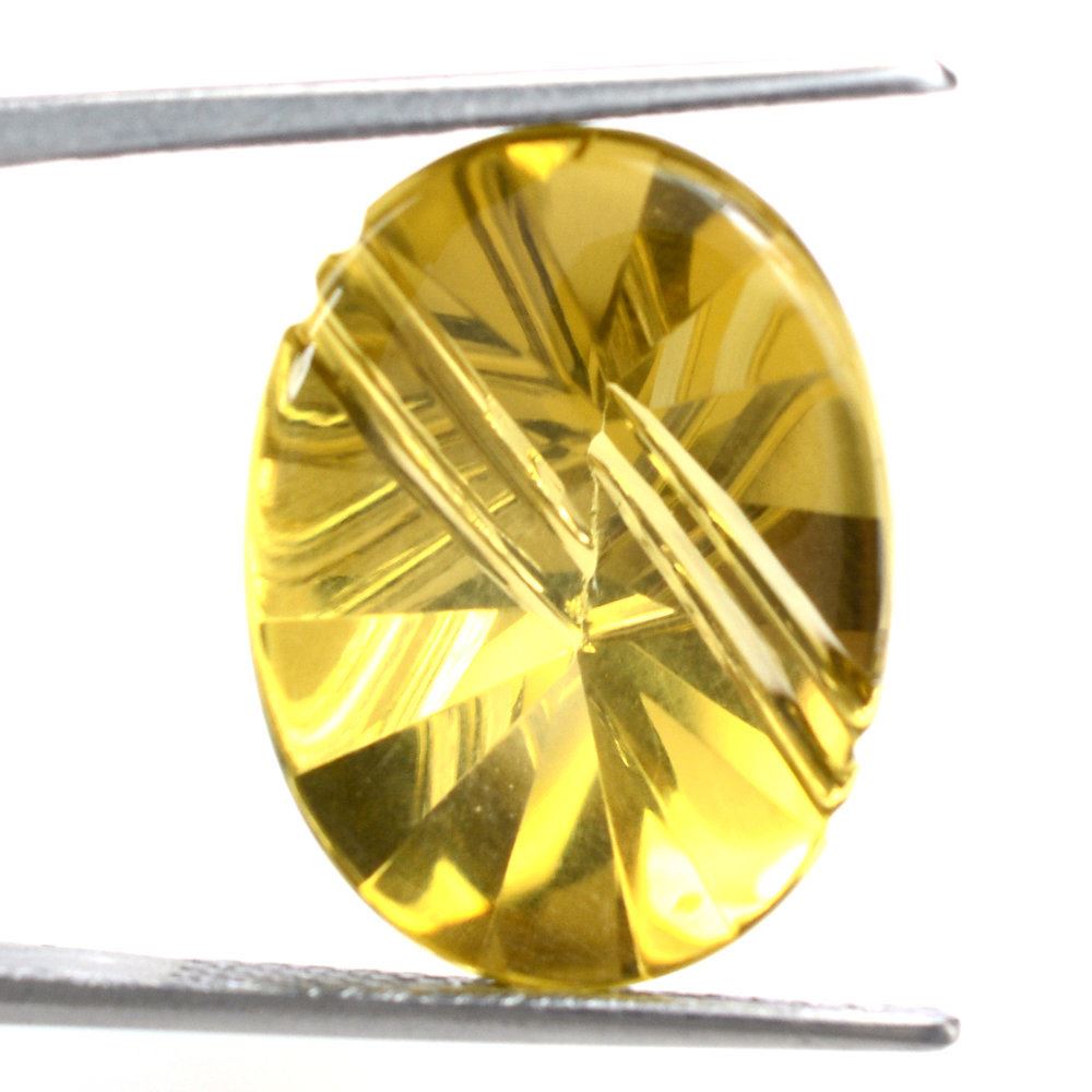 WHISKY QUARTZ FLAT BUFFTOP LIGHTENING OVAL (DES#114) 20X15MM 13.55 Cts.