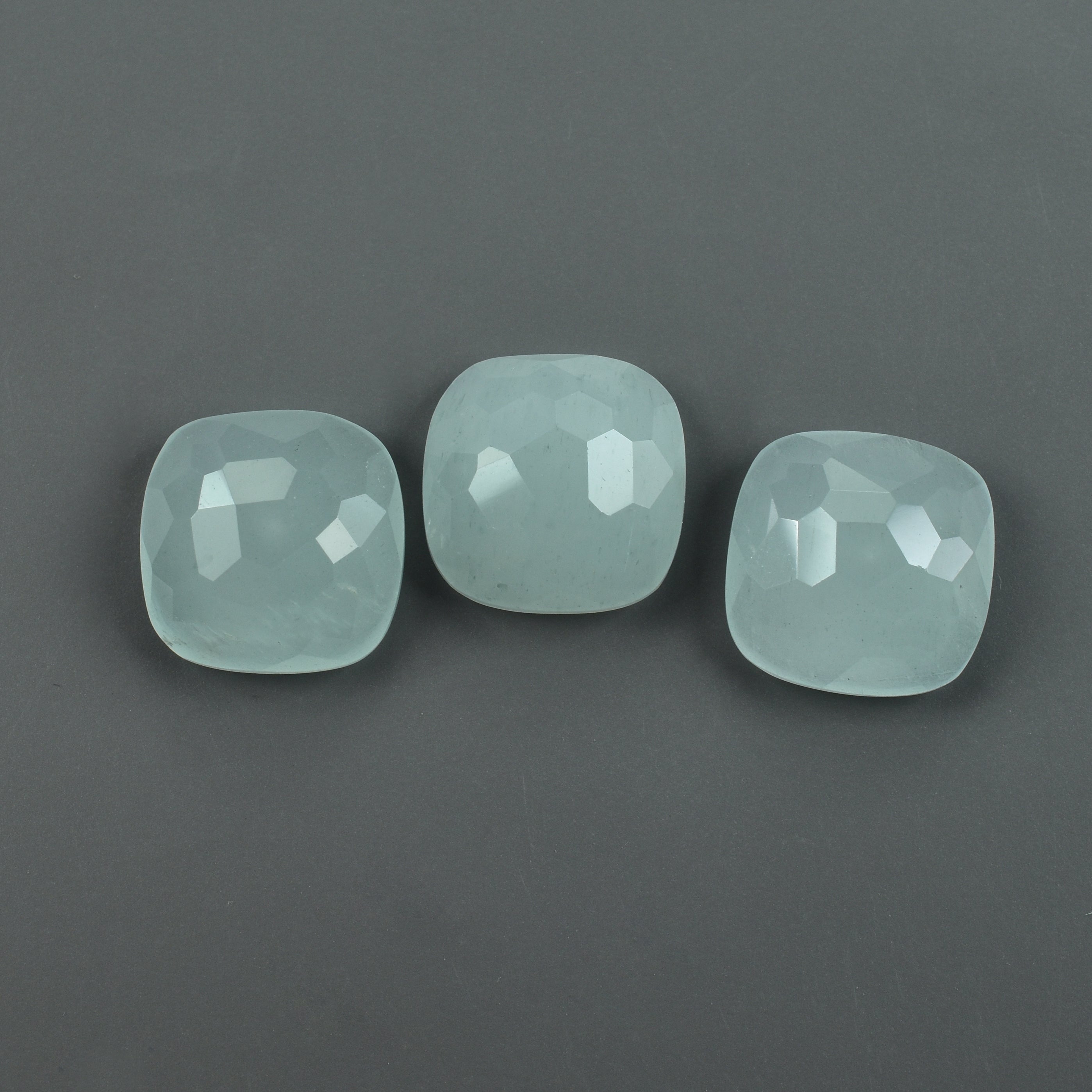 MILKY AQUAMARINE IRREGULAR CUT CUSHION CAB 12MM 5.84 Cts.