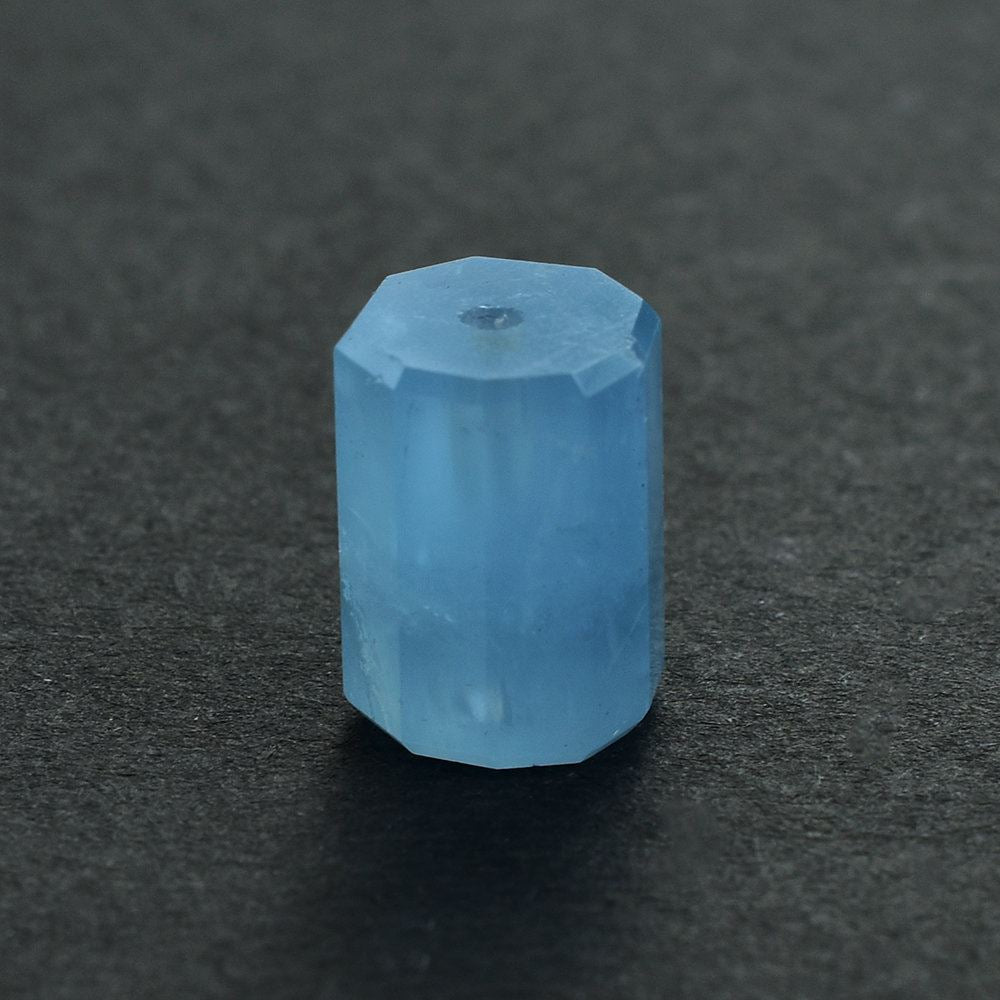 MILKY AQUAMARINE BARREL (HALF-DRILL) (AAA) 11X8MM 7.23 Cts.
