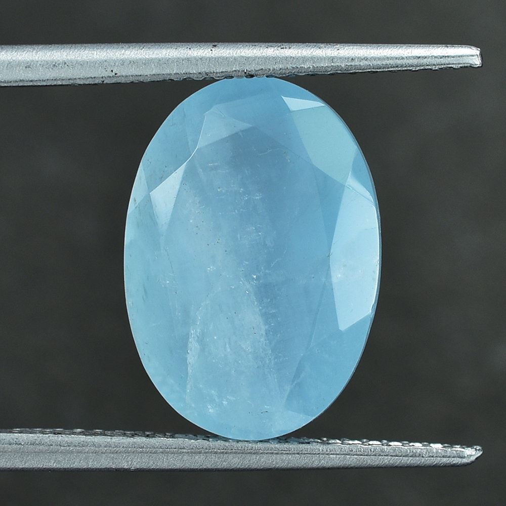 MILKY AQUAMARINE CUT OVAL (A) 14X10MM 5.40 Cts.