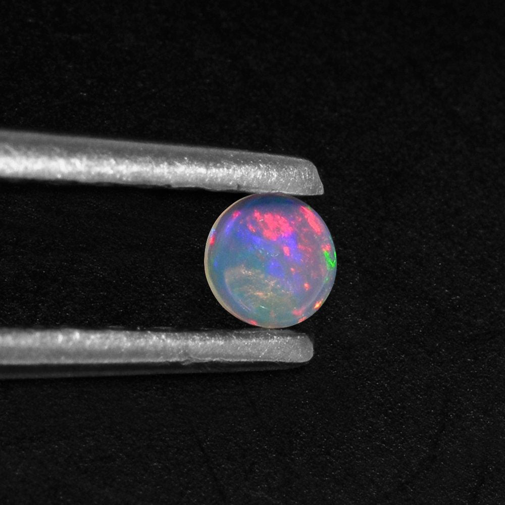 ETHIOPIAN OPAL ROUND CAB 3MM 0.08 Cts.