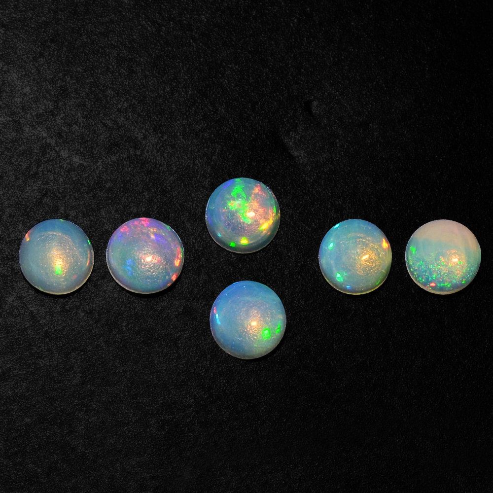 ETHIOPIAN OPAL ROUND CAB 3MM 0.08 Cts.