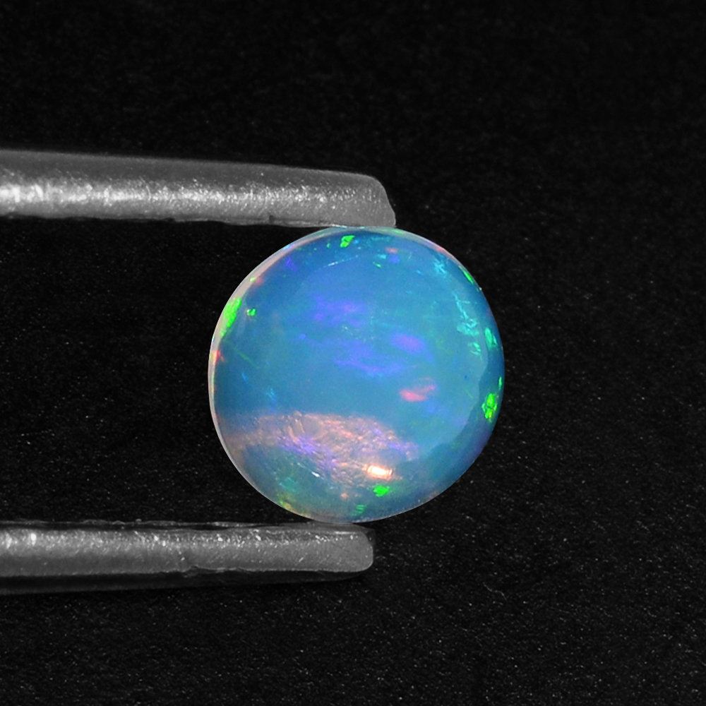 ETHIOPIAN OPAL ROUND CAB 5MM 0.27 Cts.