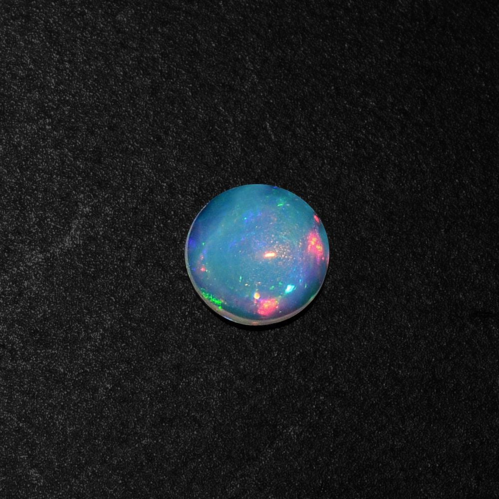 ETHIOPIAN OPAL ROUND CAB 4MM 0.15 Cts.