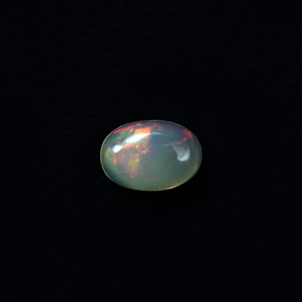 ETHIOPIAN OPAL PLAIN OVAL CAB (YELLOW TRANSPARENT/BLUE GREEN POWER) 6.00X4.00 MM 0.24 CTS