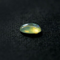 ETHIOPIAN OPAL PLAIN OVAL CAB (YELLOW TRANSPARENT/BLUE GREEN POWER) 6.00X4.00 MM 0.24 CTS