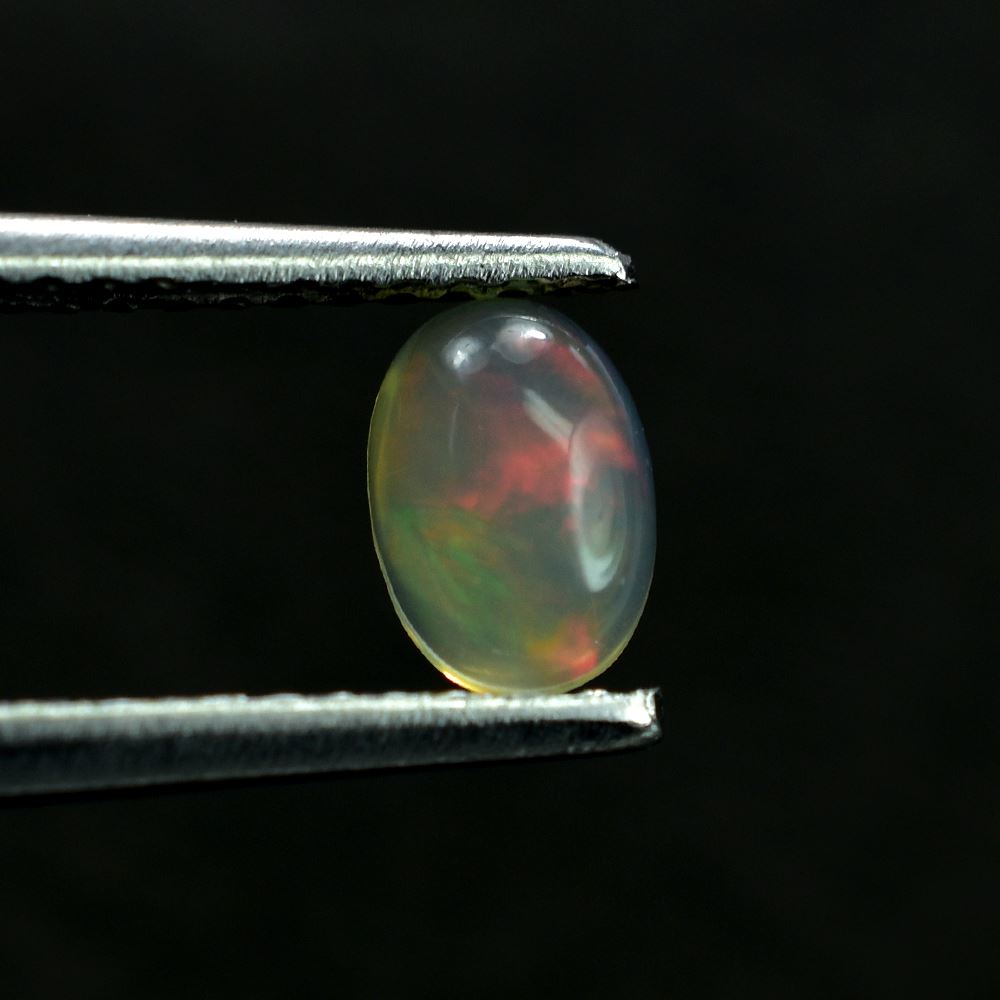 ETHIOPIAN OPAL PLAIN OVAL CAB (YELLOW TRANSPARENT/BLUE GREEN POWER) 6.00X4.00 MM 0.24 CTS