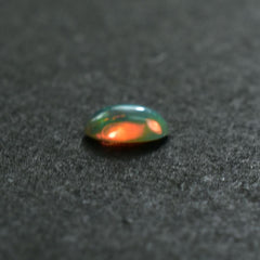 ETHIOPIAN OPAL PLAIN OVAL CAB (YELLOWISH/MULTI POWER) 6.00X4.00 MM 0.26 CTS