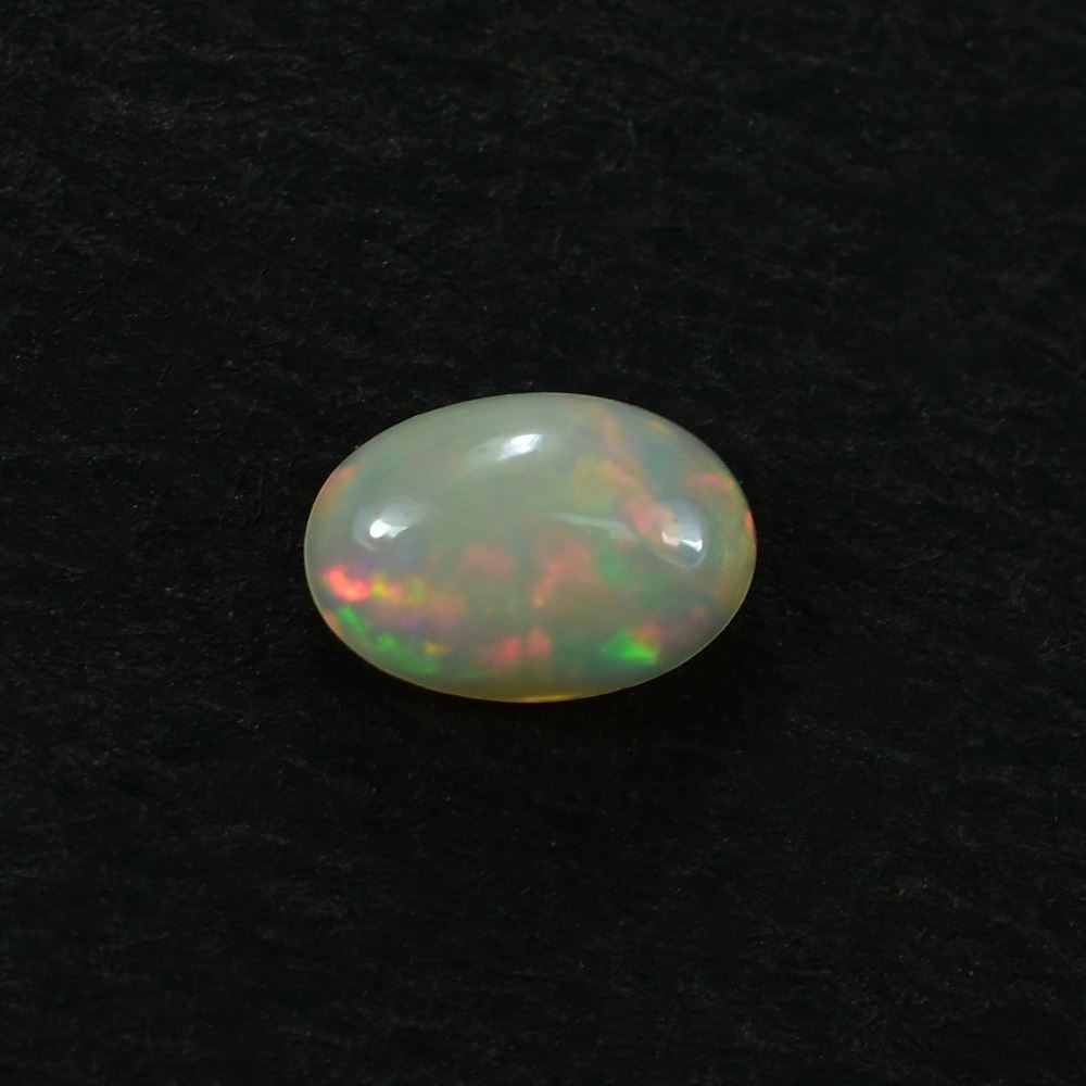 ETHIOPIAN OPAL PLAIN OVAL CAB (WHITE BASE/MULTI POWER) 6.00X4.00 MM 0.25 CTS