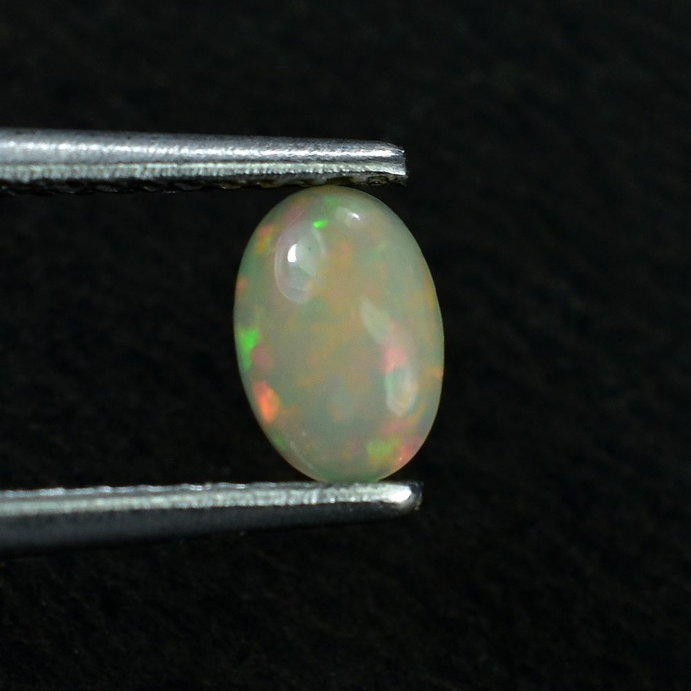 ETHIOPIAN OPAL PLAIN OVAL CAB (WHITE BASE/MULTI POWER) 6.00X4.00 MM 0.25 CTS