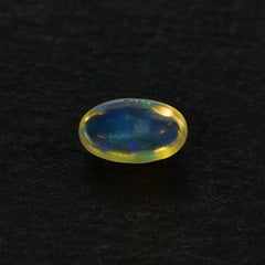 ETHIOPIAN OPAL PLAIN OVAL CAB (YELLOWISH TRANSPARENT/VERY LOW POWER) 5.00X3.00 MM 0.12 CTS