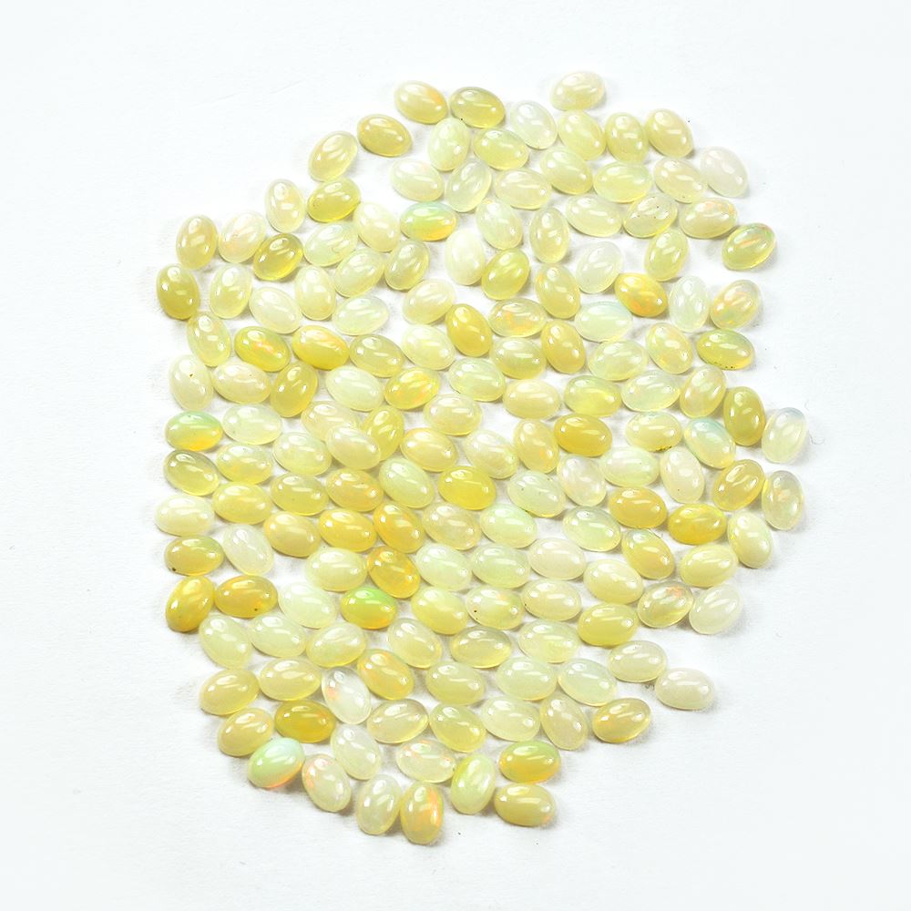 ETHIOPIAN OPAL PLAIN OVAL CAB (OFF WHITE MILKY/VERY LOW MULTI POWER) 6.00X4.00 MM 0.25 CTS