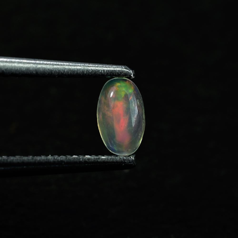 ETHIOPIAN OPAL PLAIN OVAL CAB (OFF WHITE TRANSPARENT/VERY LOW POWER) 5.00X3.00 MM 0.13 CTS