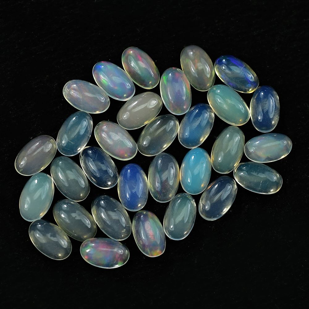 ETHIOPIAN OPAL PLAIN OVAL CAB (OFF WHITE TRANSPARENT/VERY LOW POWER) 5.00X3.00 MM 0.13 CTS