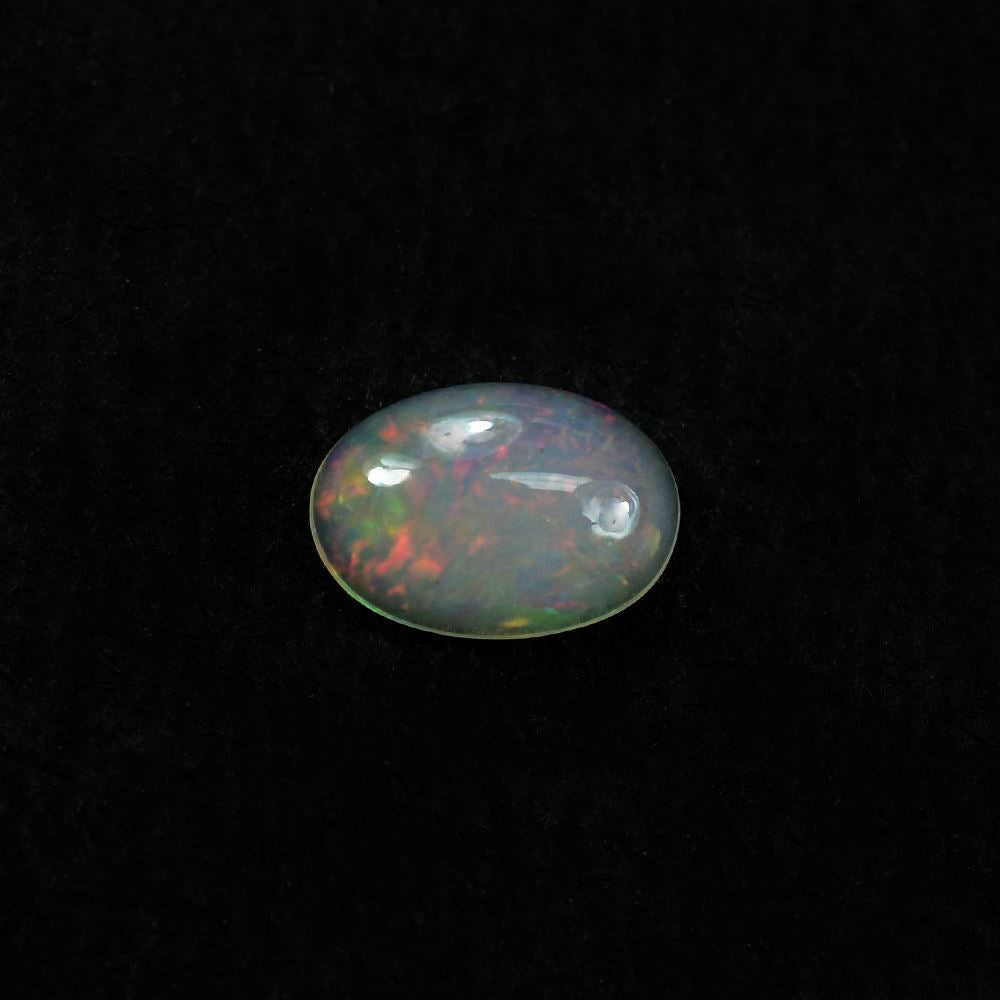 ETHIOPIAN OPAL PLAIN OVAL CAB (OFF WHITE TRANSPARENT/VERY LOW POWER) 6.00X4.00 MM 0.25CTS