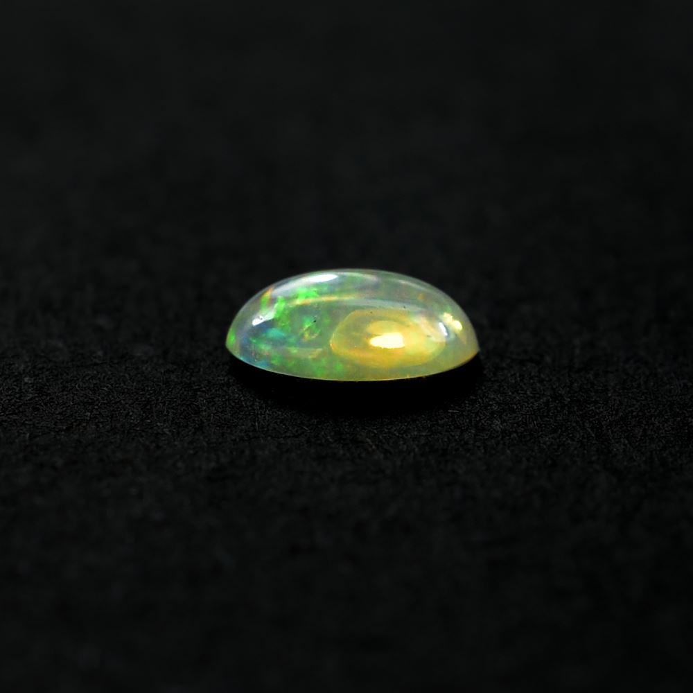 ETHIOPIAN OPAL PLAIN OVAL CAB (OFF WHITE TRANSPARENT/VERY LOW POWER) 6.00X4.00 MM 0.25CTS