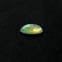 ETHIOPIAN OPAL PLAIN OVAL CAB (OFF WHITE TRANSPARENT/VERY LOW POWER) 6.00X4.00 MM 0.25CTS