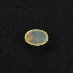 ETHIOPIAN OPAL PLAIN OVAL CAB (OFF WHITE TRANSPARENT/VERY LOW POWER) 6.00X4.00 MM 0.25CTS