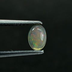 ETHIOPIAN OPAL PLAIN OVAL CAB (OFF WHITE TRANSPARENT/VERY LOW POWER) 6.00X4.00 MM 0.25CTS