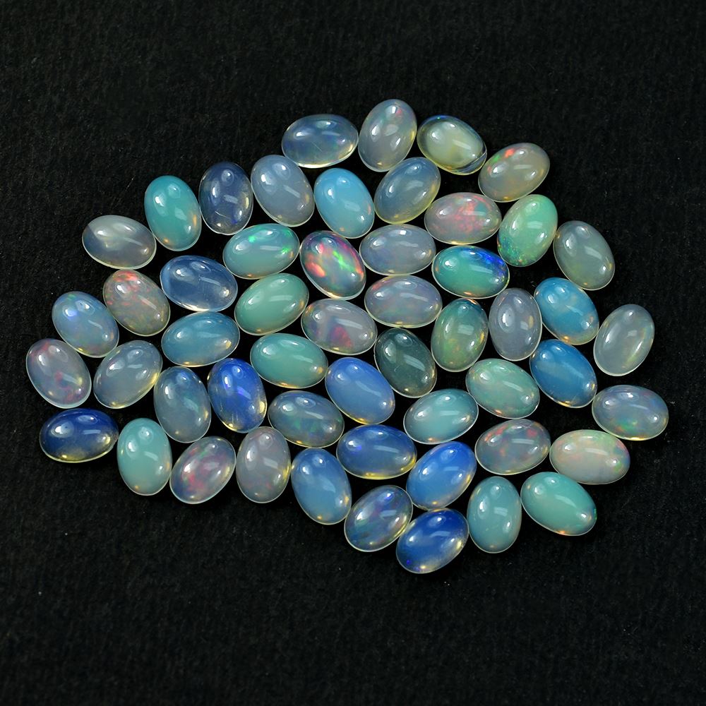 ETHIOPIAN OPAL PLAIN OVAL CAB (OFF WHITE TRANSPARENT/VERY LOW POWER) 6.00X4.00 MM 0.25CTS