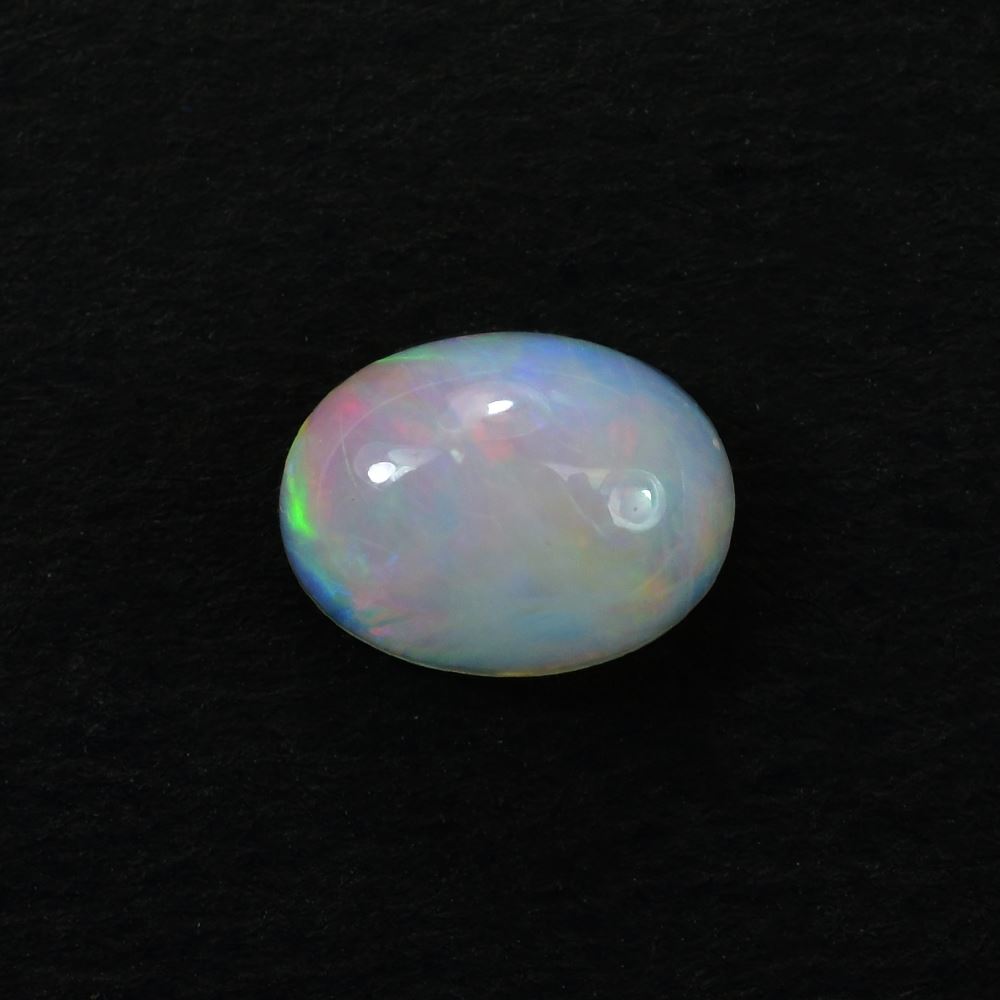 ETHIOPIAN OPAL PLAIN OVAL CAB (OFF WHITE MILKY/VERY LOW MULTI POWER) 8.00X6.00 MM 0.73 CTS