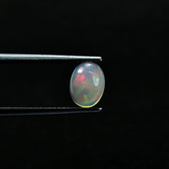 ETHIOPIAN OPAL PLAIN OVAL CAB (OFF WHITE MILKY/VERY LOW MULTI POWER) 8.00X6.00 MM 0.73 CTS