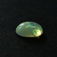 ETHIOPIAN OPAL PLAIN OVAL CAB (WHITE BASE /VERY LOW POWER/BLUE GREEN POWER) 8.00X6.00 MM 0.78 CTS