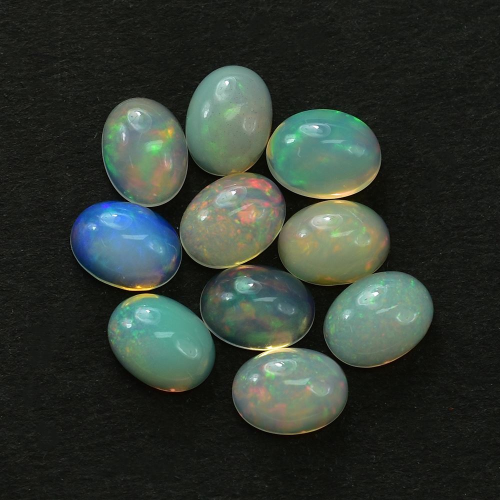 ETHIOPIAN OPAL PLAIN OVAL CAB (WHITE BASE /VERY LOW POWER/BLUE GREEN POWER) 8.00X6.00 MM 0.78 CTS