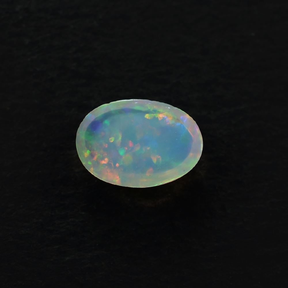 ETHIOPIAN OPAL PLAIN OVAL CAB (WHITE BASE/GREEN POWER) 7.00X5.00 MM 0.47 CTS