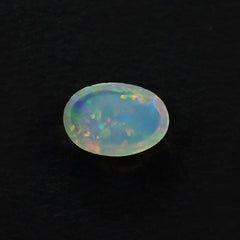 ETHIOPIAN OPAL PLAIN OVAL CAB (WHITE BASE/GREEN POWER) 7.00X5.00 MM 0.47 CTS