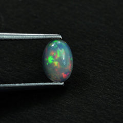 ETHIOPIAN OPAL PLAIN OVAL CAB (WHITE BASE/GREEN POWER) 7.00X5.00 MM 0.47 CTS