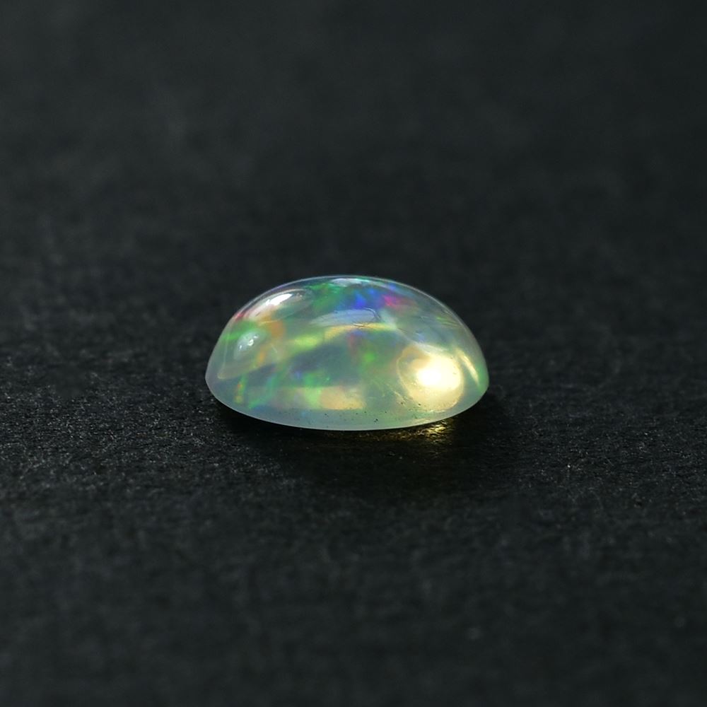 ETHIOPIAN OPAL PLAIN OVAL CAB (OFF WHITE TRANSPARENT/VERY LOW POWER) 8.00X6.00 MM 0.75 CTS