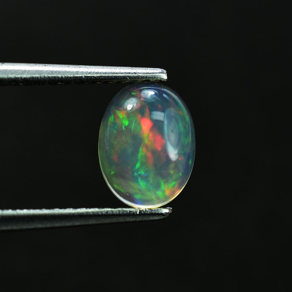 ETHIOPIAN OPAL PLAIN OVAL CAB (OFF WHITE TRANSPARENT/VERY LOW POWER) 8.00X6.00 MM 0.75 CTS