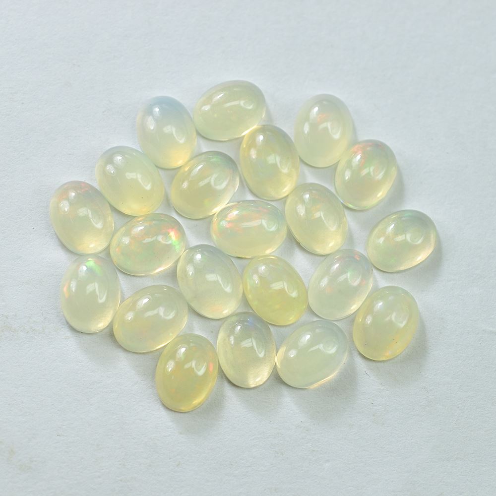 ETHIOPIAN OPAL PLAIN OVAL CAB (OFF WHITE TRANSPARENT/VERY LOW POWER) 8.00X6.00 MM 0.75 CTS