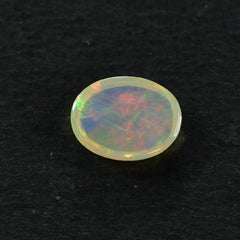 ETHIOPIAN OPAL PLAIN OVAL CAB (YELLOW BASE/REDISH/GREEN POWER) 8.00X6.00 MM 0.73 CTS