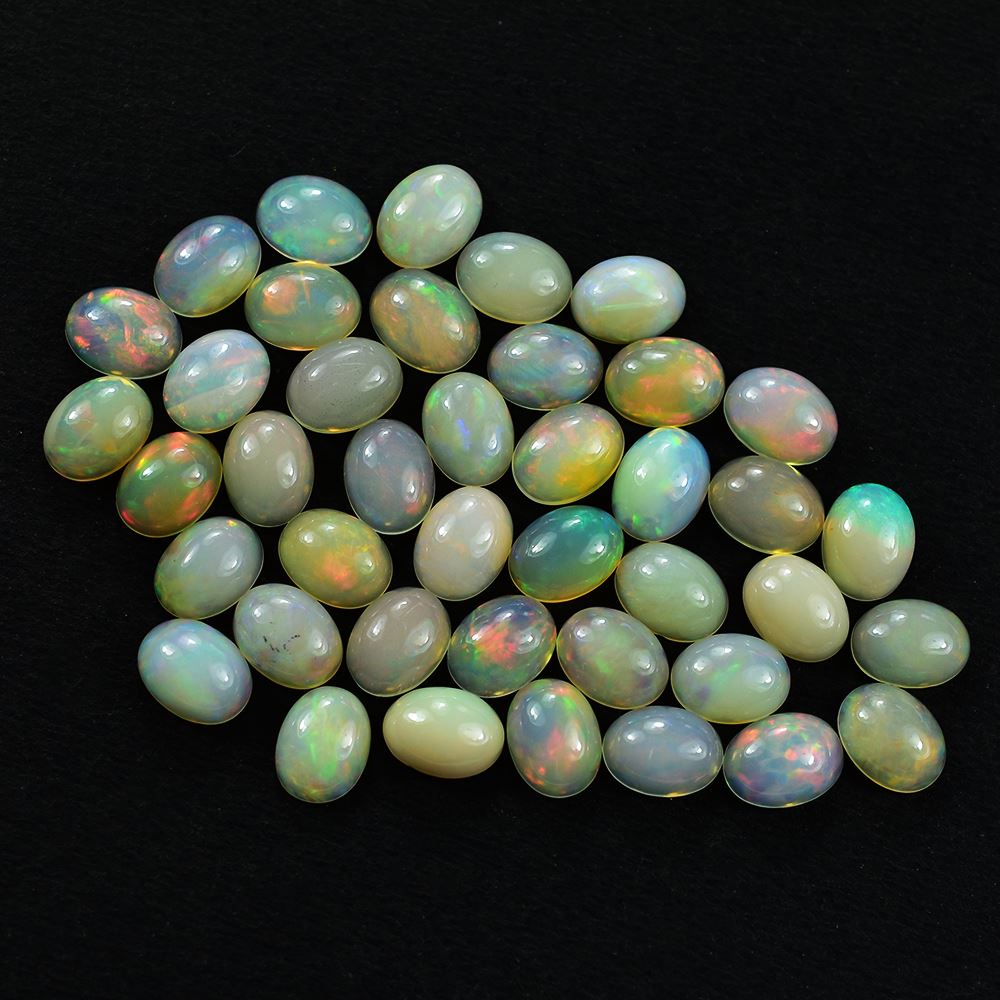 ETHIOPIAN OPAL PLAIN OVAL CAB (YELLOW BASE/REDISH/GREEN POWER) 8.00X6.00 MM 0.73 CTS