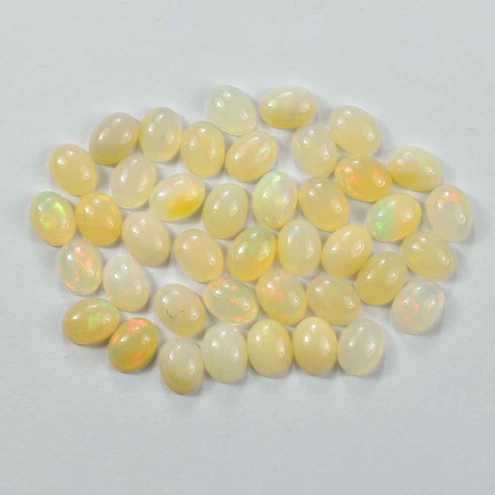 ETHIOPIAN OPAL PLAIN OVAL CAB (YELLOW BASE/REDISH/GREEN POWER) 8.00X6.00 MM 0.73 CTS