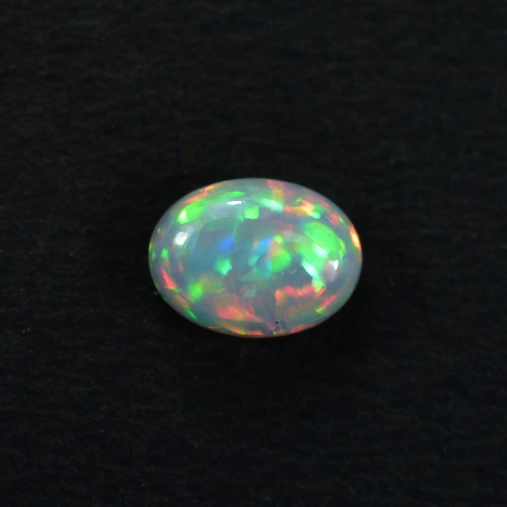 ETHIOPIAN OPAL PLAIN OVAL CAB (WHITE BASE/BLUE GREEN POWER) 8.00X6.00 MM 0.77 CTS